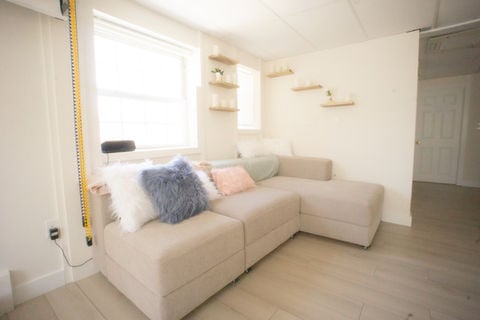 A quiet seating area in the Feather and Flame studio